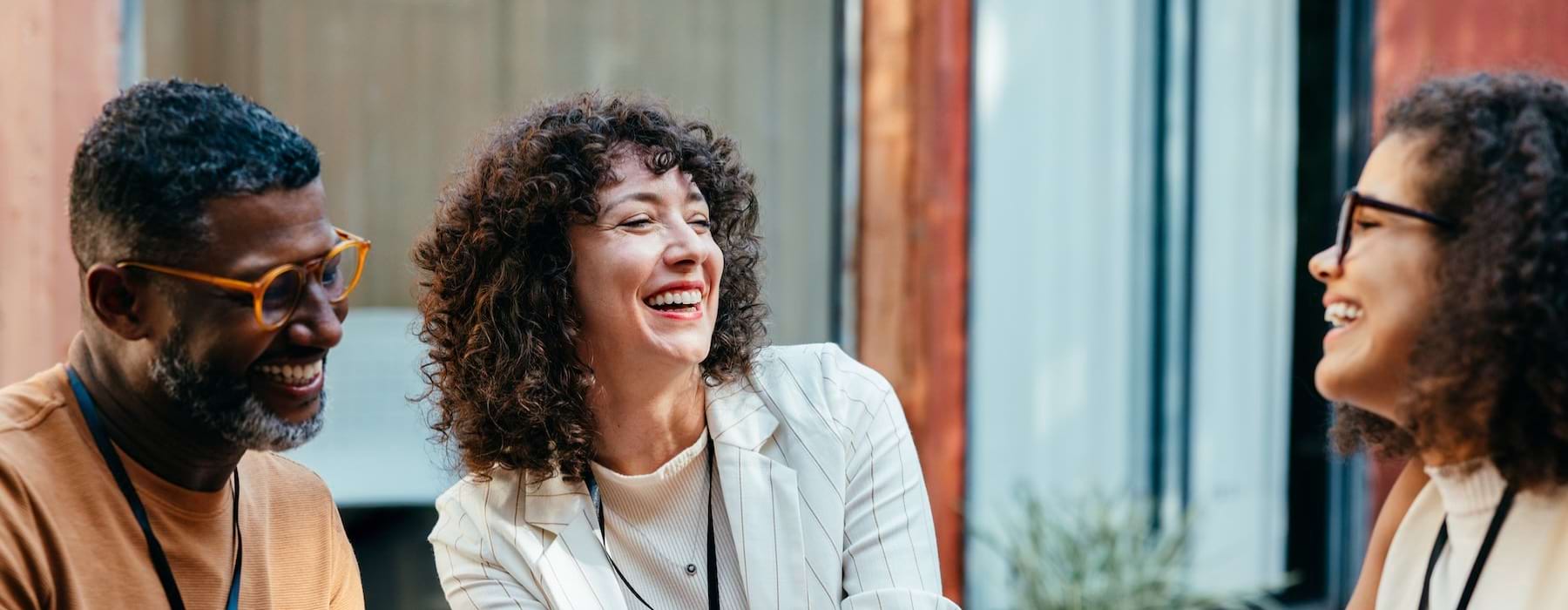 three people laughing